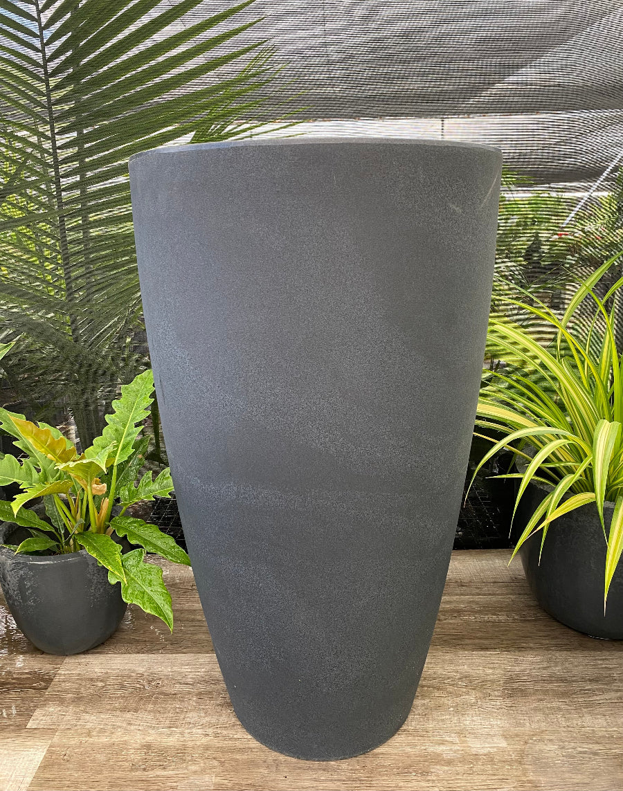 Tall modern planter for indoor or outdoor use.